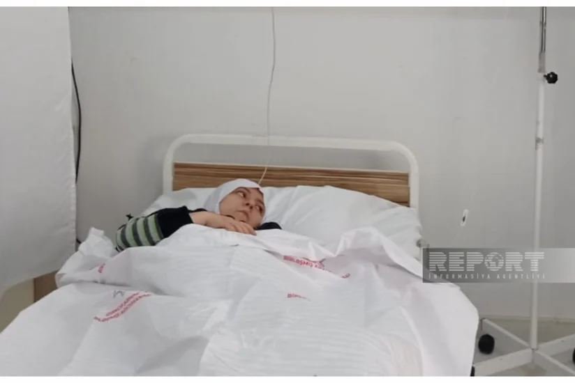 Partlayışda zərər çəkən qadın: Yuxuda idim, bir də ayıldım ki, otağın tavanı üzərimə düşüb