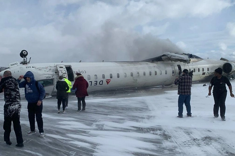 Delta plane flips upside down on landing at Toronto airport, injuring 18
