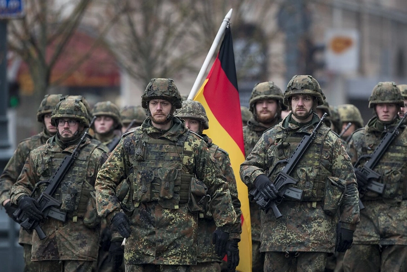 German defense minister says Berlin should increase military spending