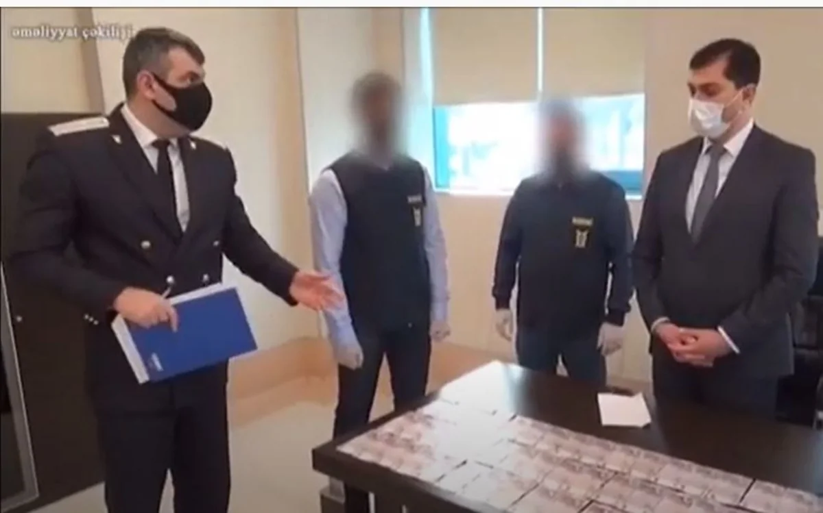 Koronavirus xəstələrindən rüşvət alanların saxlanma görüntüləri - VİDEO