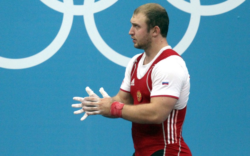 Rusiyalı ağırlıqqaldıran dünya çempionatında qazandığı qızıl medaldan məhrum edilib