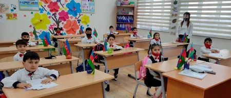 Üzü sipərli müəllimlər, maskalı şagirdlər  - FOTOREORTAJ