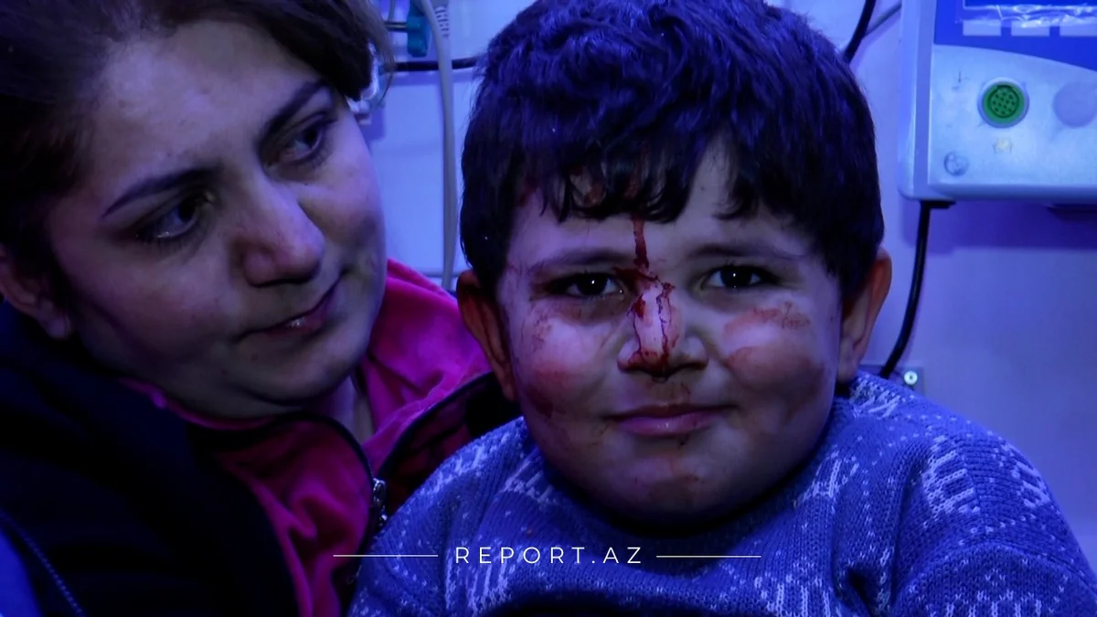 Gəncədə yaralanan uşaq: Daşın altında qaldım