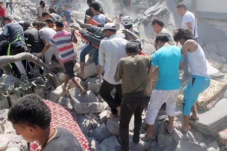 ​Suriyada bir məhəlləyə hücumda 15 nəfər ölüb, onlarla insan yaralanıb - FOTO