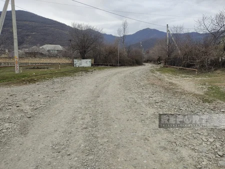 Asfalt dağılıb, yağış yağan kimi palçıq dizə çıxır - Calut sakinlərinin yol problemi