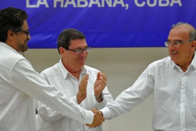 Colombia ends 52-year conflict, government and rebels sign accord