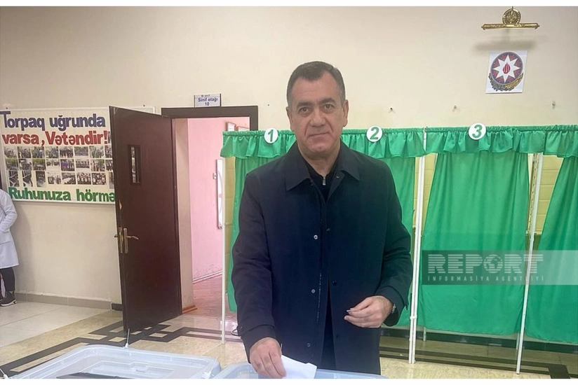 Presidential candidate Gudrat Hasanguliyev exercises his right to vote