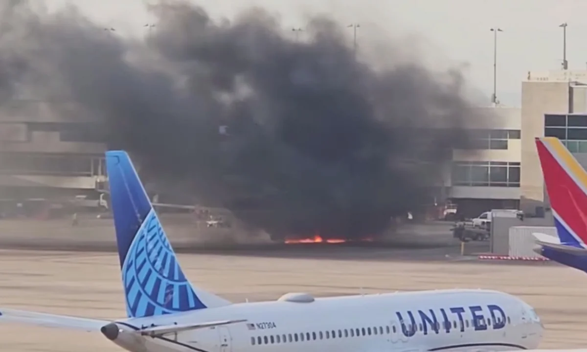 American Airlines flight catches fire at Denver airport