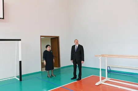 President Ilham Aliyev views newly-reconstructed school No 187 in Mashtagha settlement