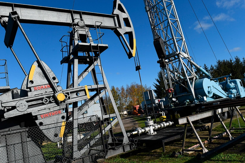Oil companies in Europe and US  write down $145 billion in assets