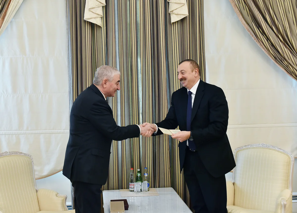 CEC Chairman Panahov presents presidential candidate certificate to Ilham Aliyev