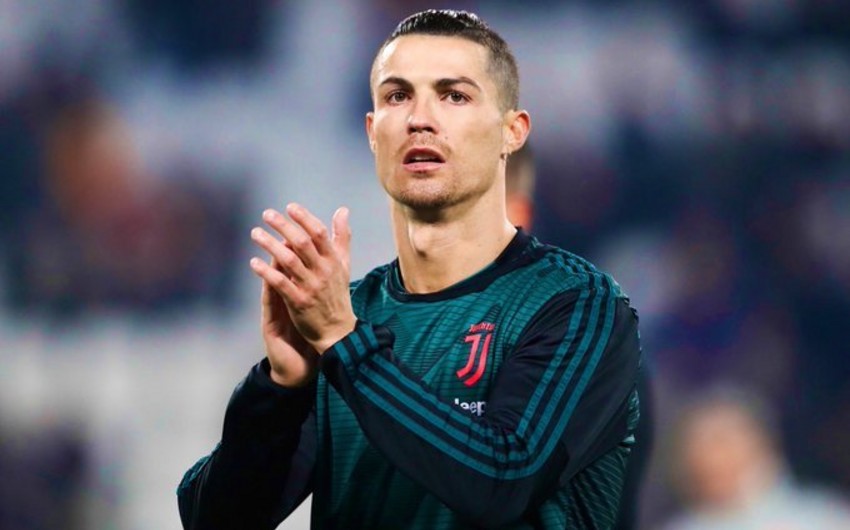 Evdə qal deyən Ronaldu ailəsini gəzintiyə çıxardı