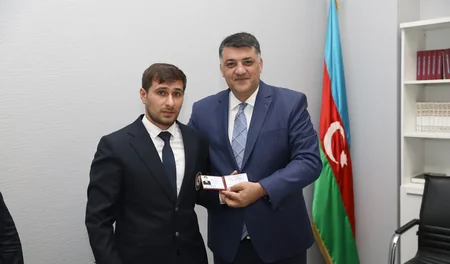 Gənc cüdo hakimlərinə dərəcə kitabçaları təqdim olunub