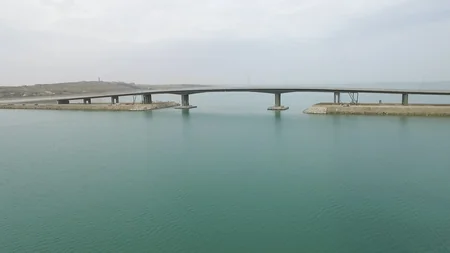 President Ilham Aliyev inaugurates a new bridge in Pirallahi settlement