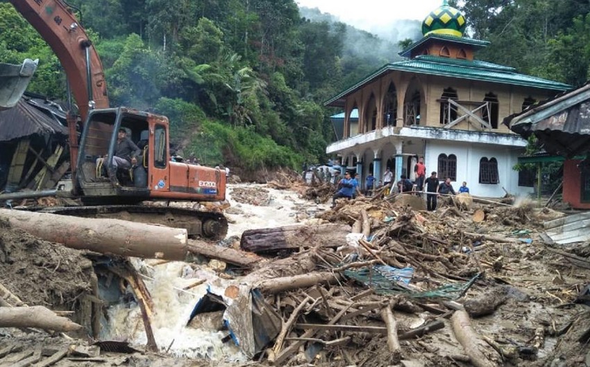 20 killed when flooding wipes out part of school in Indonesia