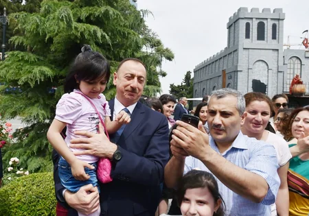 Ilham Aliyev attends the opening of Baku White City boulevard
