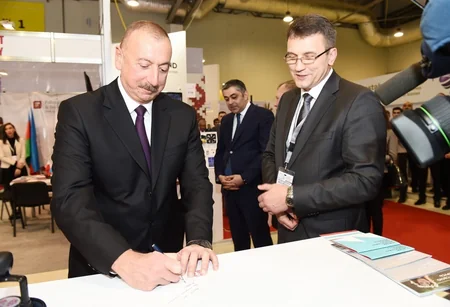President Ilham Aliyev views Bakutel 2018 exhibition