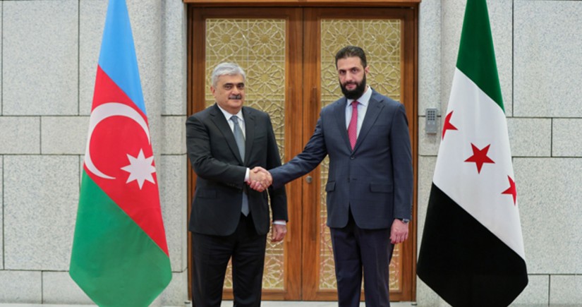 Azerbaijani Deputy PM Samir Sharifov meets with Syria's interim president