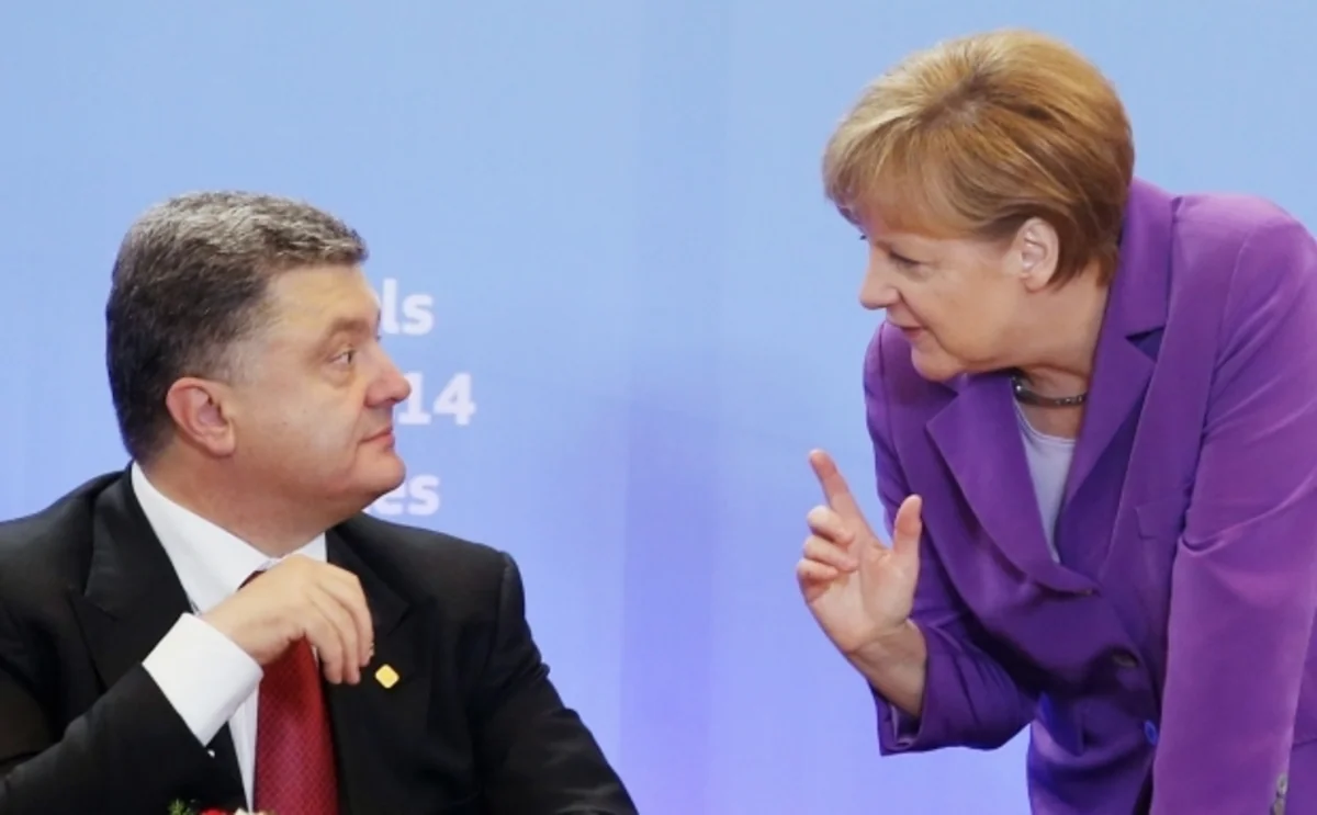 Порошенко и Меркель договорились о встрече глав МИД нормандской четверки