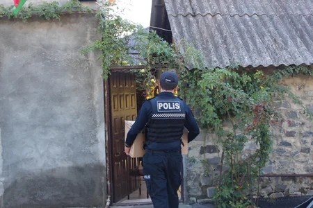 Qax polisinin əməkdaşları şəhid ailələrini ziyarət edib