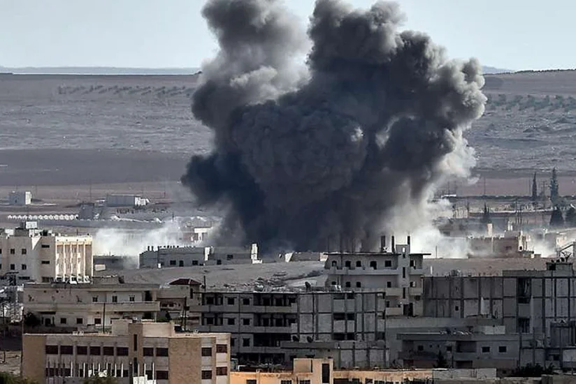 Suriyanın Rəqqa şəhəri bombalanıb, 40 nəfər ölüb