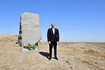 Ilham Aliyev and Mehriban Aliyeva visit memorial plaque dedicated to Remembrance Day in Qarakhanbayli