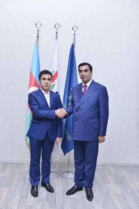 BHOS students distributed notebooks on Oil Workers Day