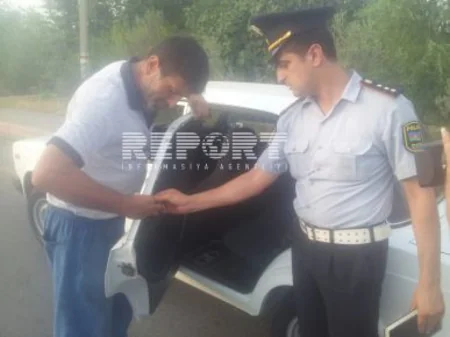 Avtomobilinə şüar yazan sürücü cərimələnib - FOTO