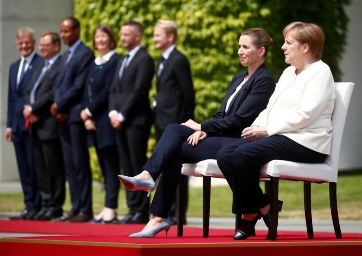 Welt: Merkel sits through country's national anthem at meeting with Denmark PM