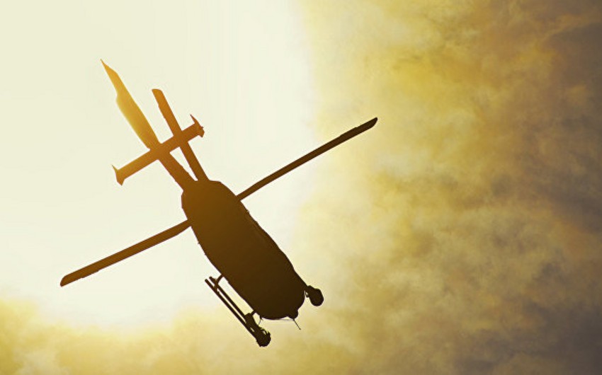 İtaliyada hərbi helikopter təlimlər zamanı dənizə düşüb