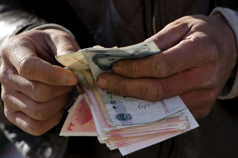 China to pay citizens for giving up traditional money