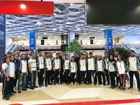 Olimpiadada iştirak etmiş Azərbaycan idmançıları Bakıya qayıdıblar - FOTO
