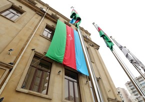 Buildings wrapped in flags all around Baku