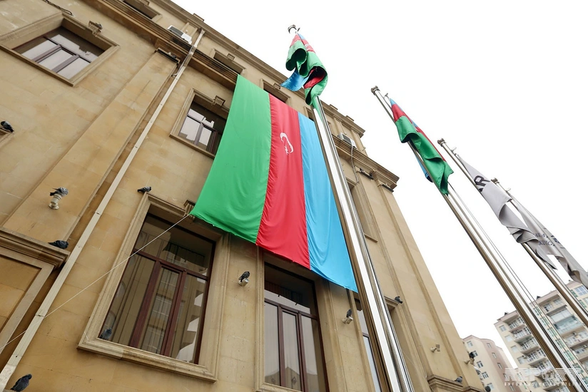 Buildings wrapped in flags all around Baku