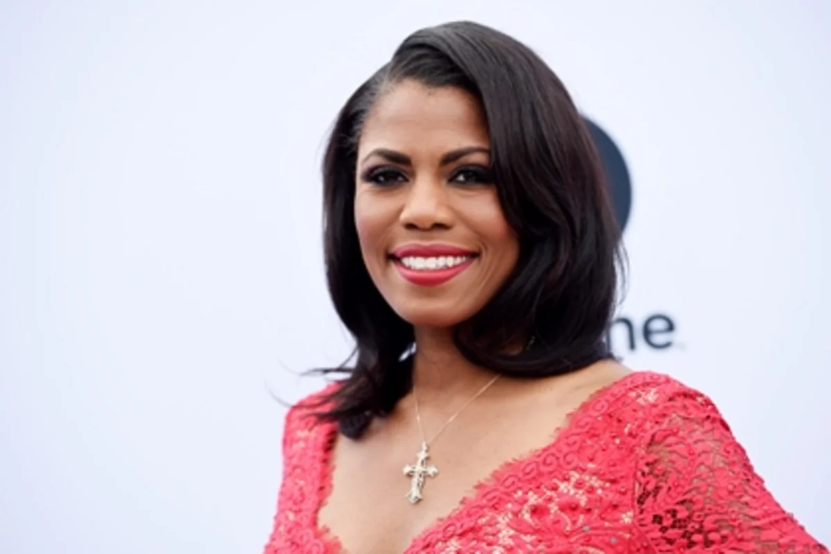 Trump brings fired contestant of his TV show to White House