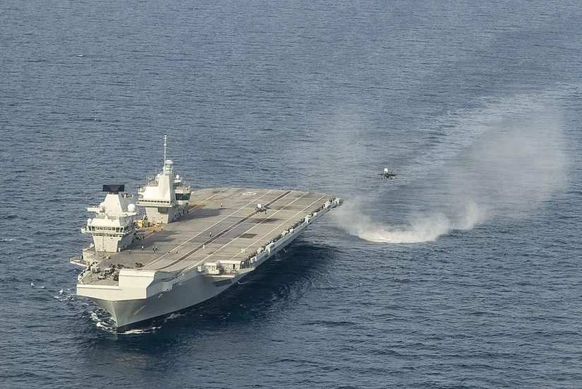 At least 100 contract COVID on UK flagship aircraft carrier