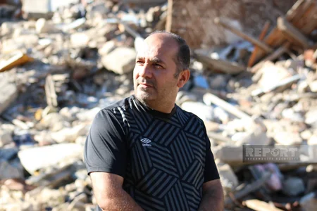 Gəncə terrorunda zərər çəkən şəxs: Dağılan evlərin saatları 02:01-də dayanmışdı