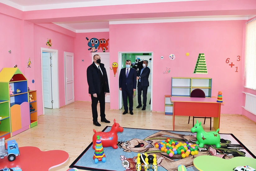 President Ilham Aliyev attends ceremony to present apartments to families of martyrs and war disabled
