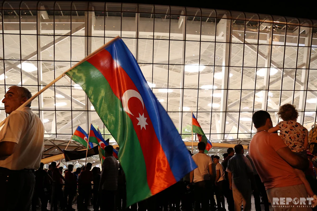 Azərbaycanın olimpiya yığması Vətənə dönüb - FOTOREPORTAJ