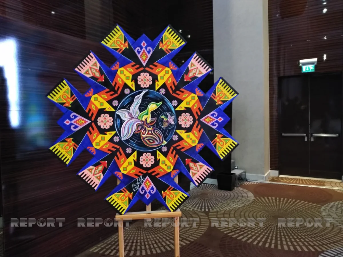 Children present handicraft called Glorious Victory to President Aliyev 