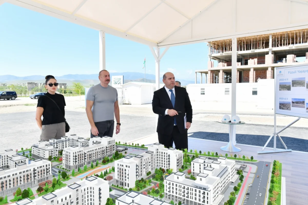 President Ilham Aliyev, First Lady Mehriban Aliyeva examine progress of work done by MIDA in Fuzuli residential complex
