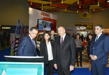 President Ilham Aliyev views Bakutel 2018 exhibition