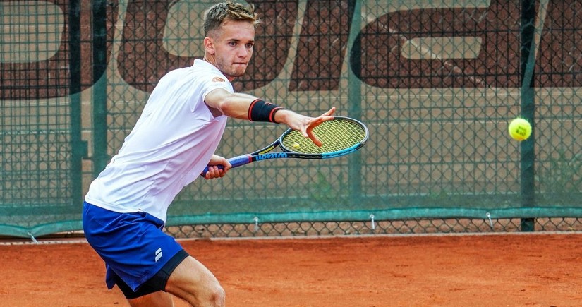 Almaniyalı tennisçi setlərarası fasilə zamanı duş qəbul etdiyi üçün diskvalifikasiya olunub