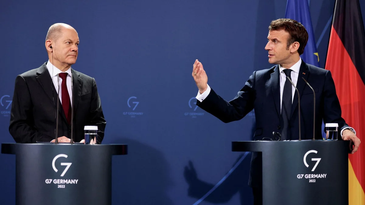 Макрон проводит в Париже переговоры с Шольцем