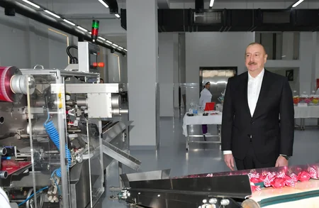 President Ilham Aliyev examines operations of confectionery manufacturing enterprise in Lankaran