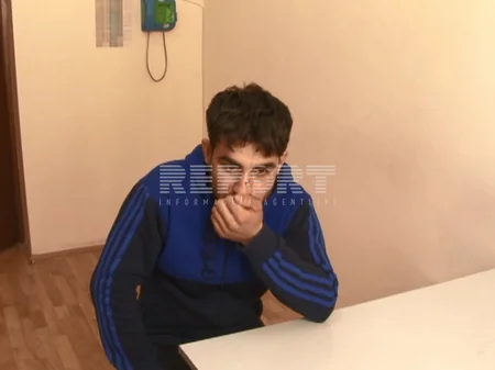 Özünü Elnur Məmmədli kimi təqdim etməklə quldurluq törədən idmançıya hökm oxunub - FOTO