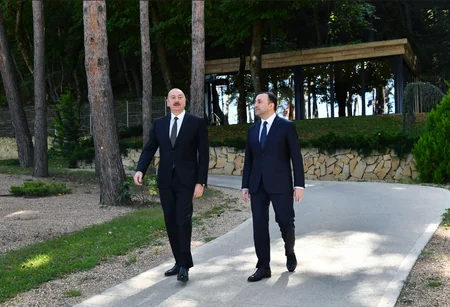President Ilham Aliyev and Prime Minister Irakli Garibashvili view photo exhibition dedicated to 100th anniversary of National Leader Heydar Aliyev