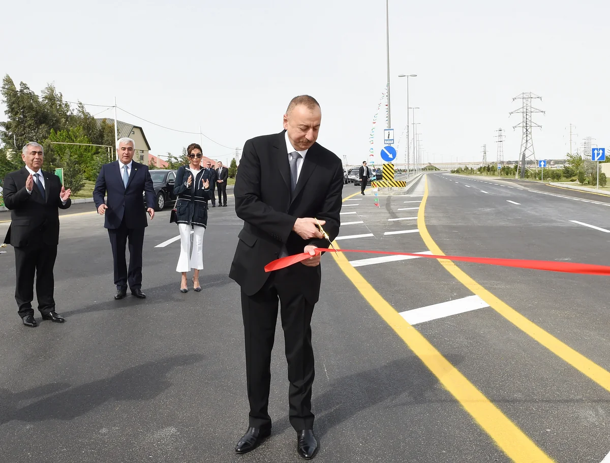 President Ilham Aliyev inaugurates a new bridge in Pirallahi settlement
