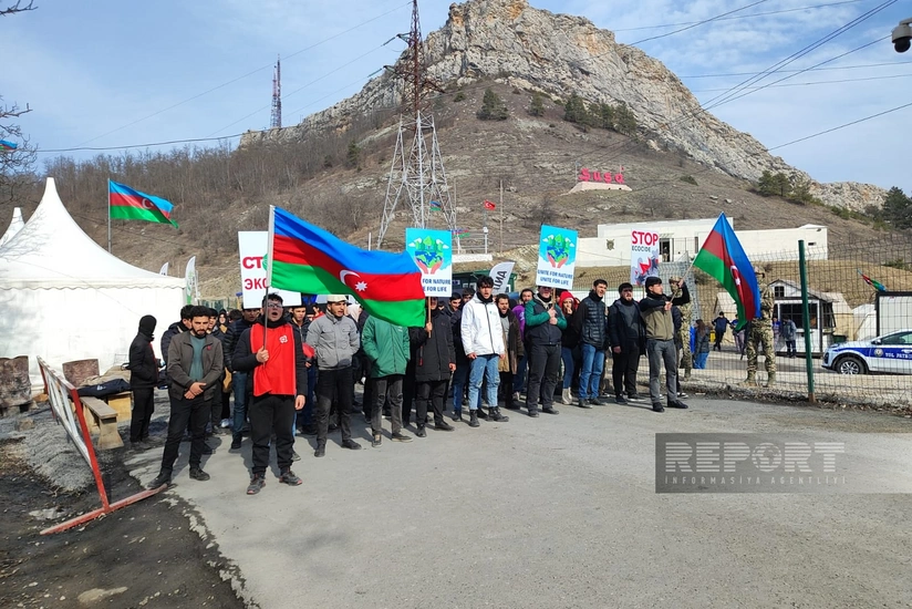Protesters continue to chant slogans during eco-protest on Khankandi-Lachin road