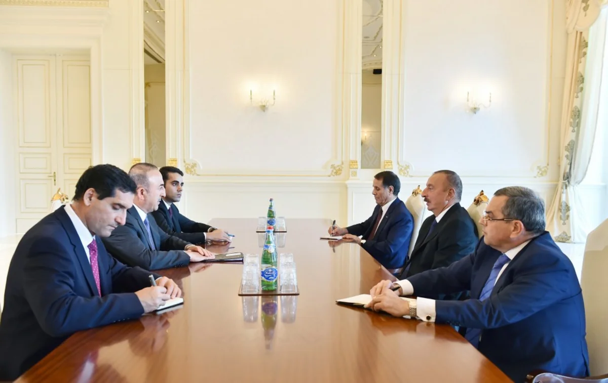 President Ilham Aliyev receives Turkish Foreign Minister